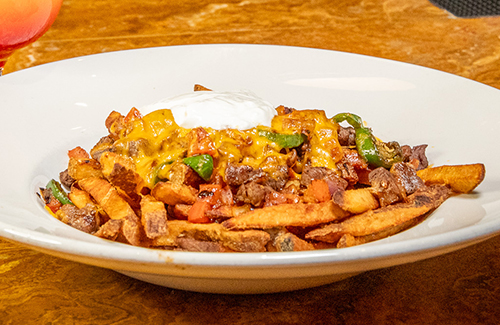 https://www.northernedgecasino.com/wp-content/uploads/2025/08/CarneAsadaFries_500x325.jpg
